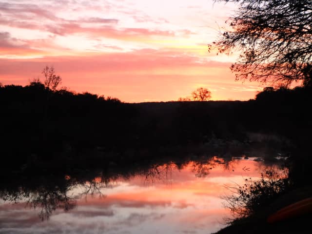 Sun 20, a sunrise and sunset photograph by Bob McNeil