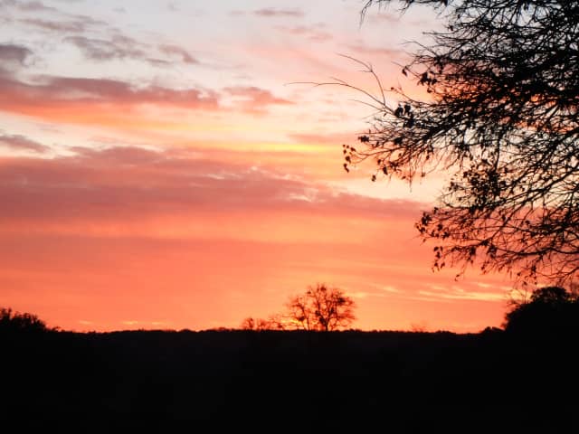 Sun 28, a sunrise and sunset photograph by Bob McNeil