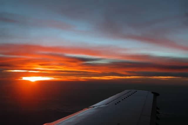 Sunset from the Plane, a aerial photograph by Bob McNeil